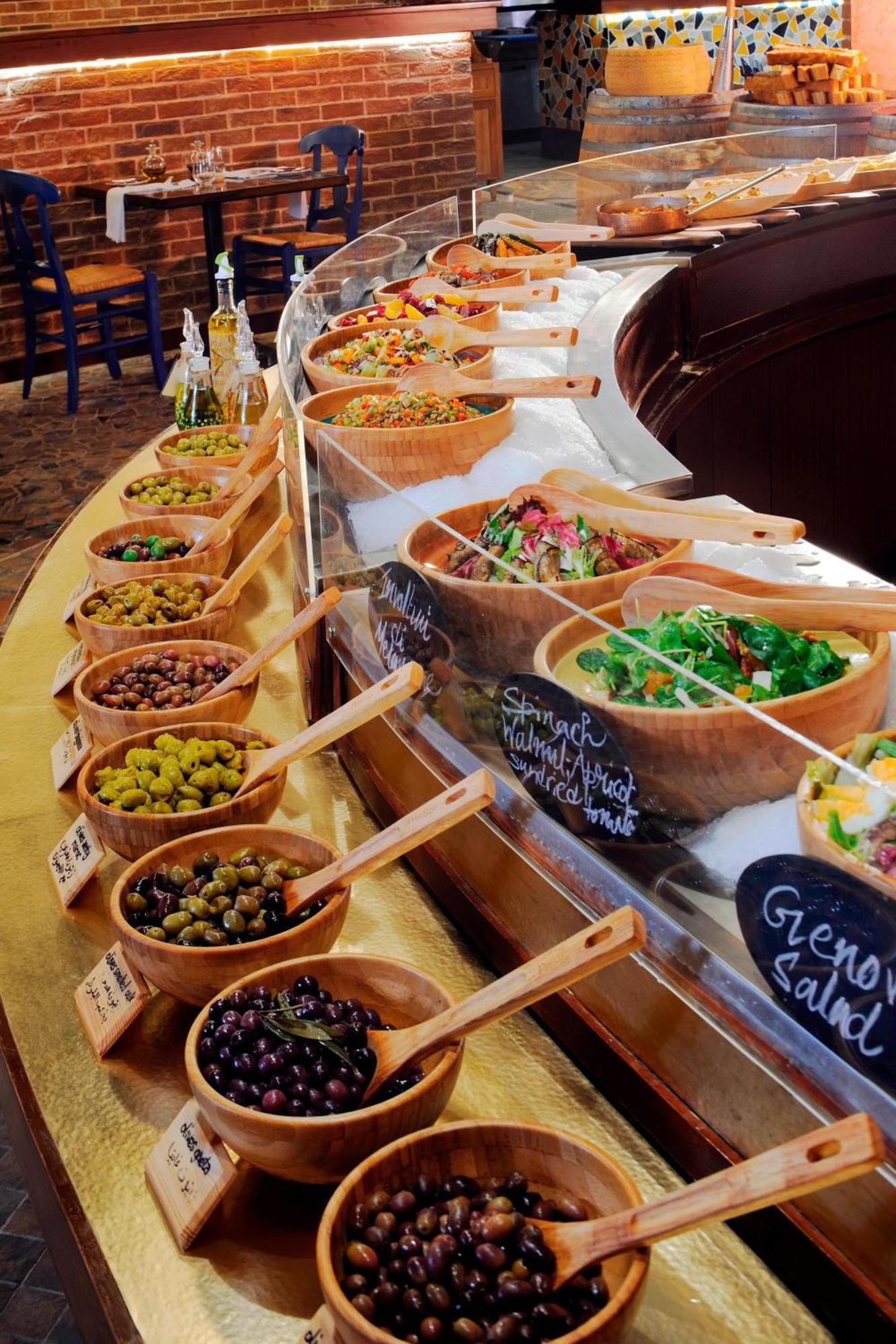 Marriott Marquis City Center Doha Hotel Kültér fotó Olives and salads at a deli in London